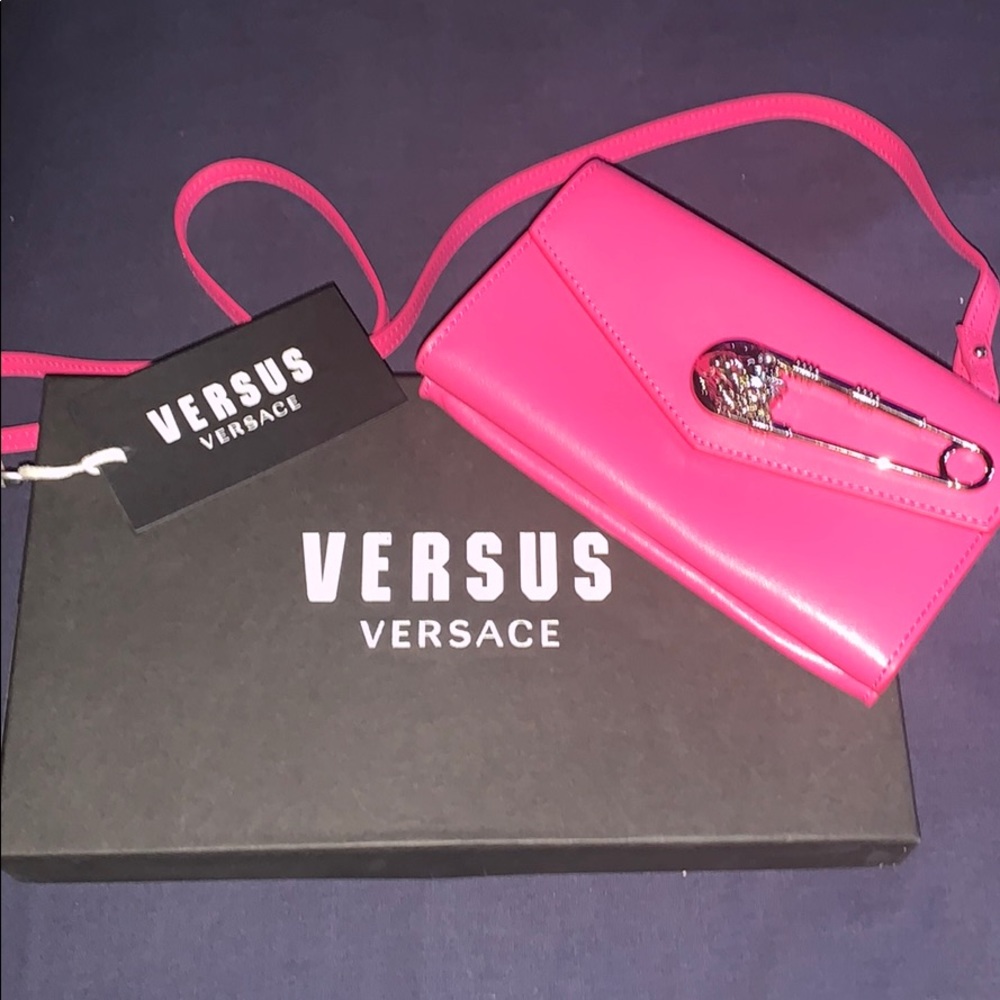 Versace lion head pin crossbody